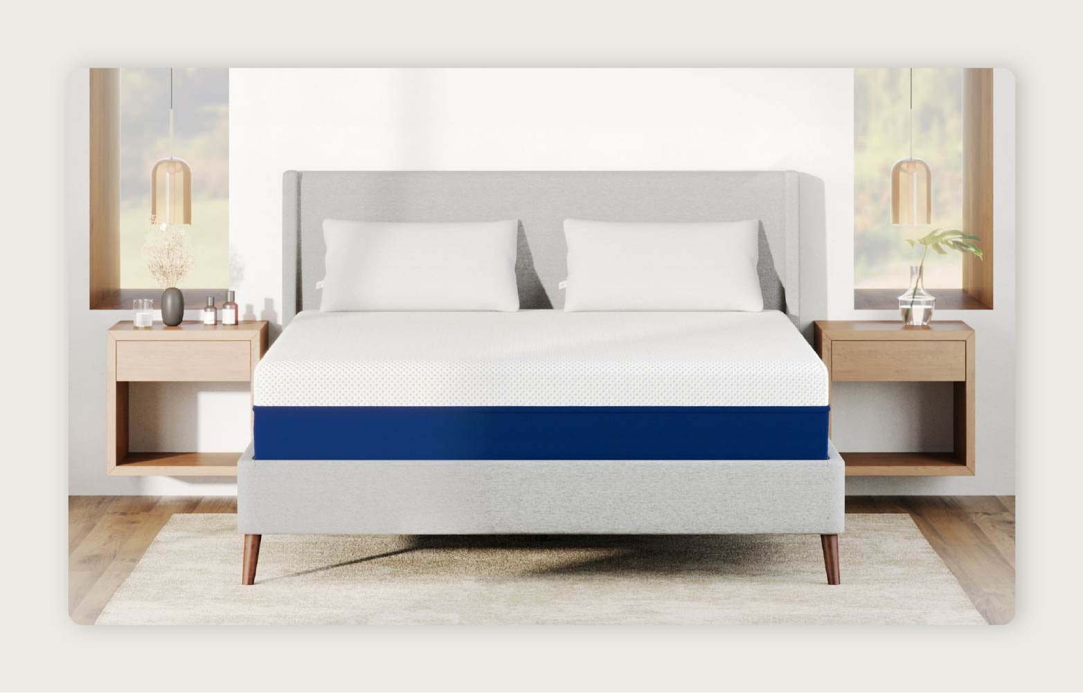 The Amerisleep AS2 Mattress in a modern room with a wooden table on each side. 
