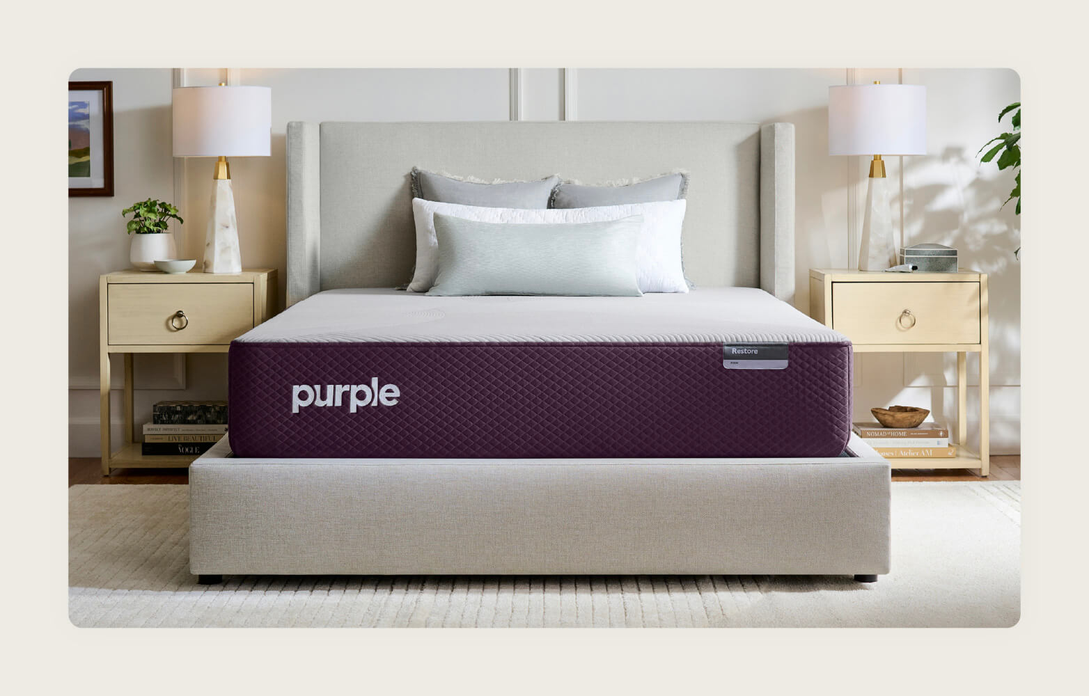 Photo of a Purple Restore Hybrid mattress in a neutral bedroom.