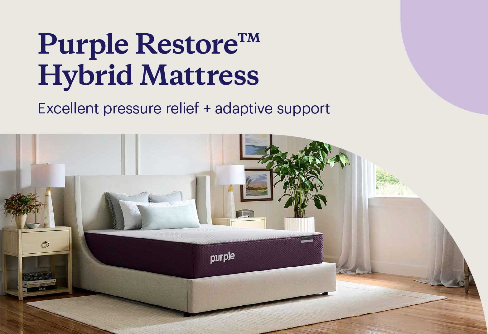 Key features of the Purple Restore™ Hybrid shown with the mattress on an upholstered bedframe with pillows and bedroom furniture.
