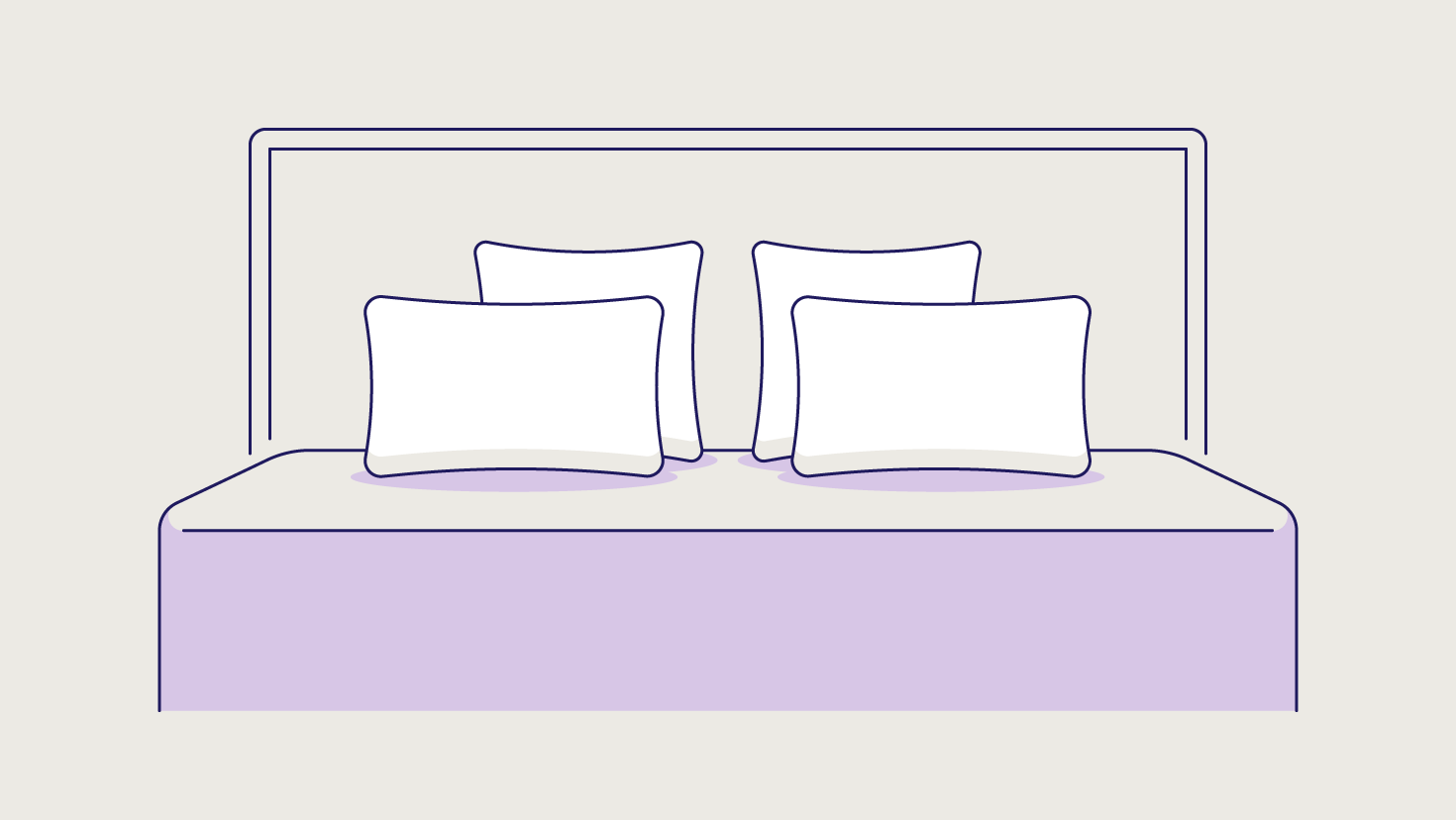 Two standard pillows propped against two square Euro pillows.