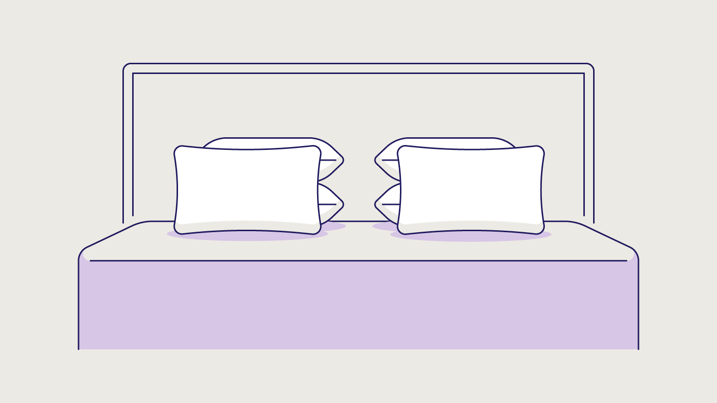 Two standard size pillows propped up against two pillow stacks.