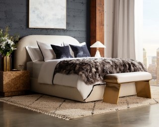 Photo of extra large bed in the center of the room