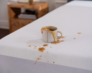 Coffee spilling on a mattress