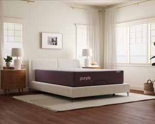 A Purple RestorePremier Hybrid mattress on an adjustable base.