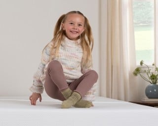a child on a mattress