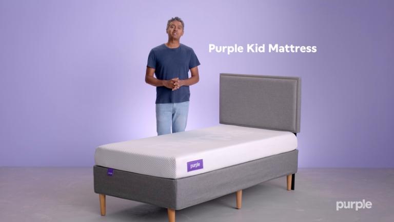 Purple store mattress crib