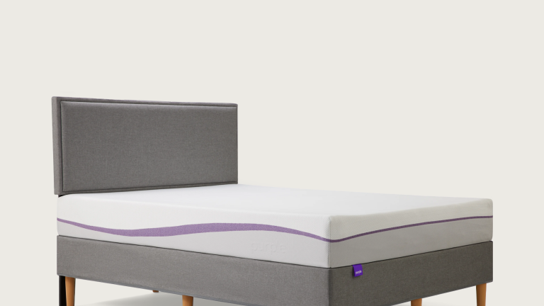 purple bed frame with mattress
