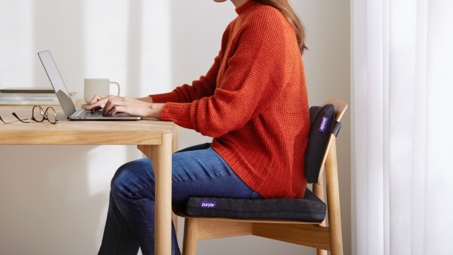 Sitting at a desk with Purple Seat Cushions