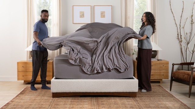 SS sheets gray w/ talent making bed