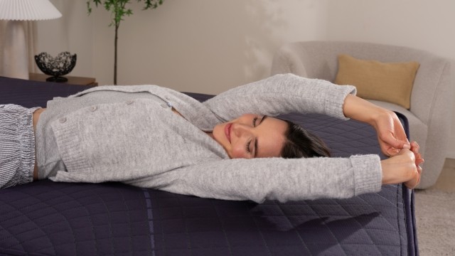 woman lying on Rejuvenate mattress