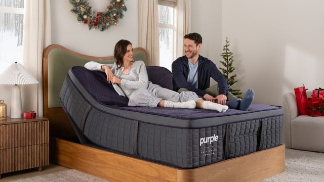 Man and woman sitting on RejuvenatePremier Mattress