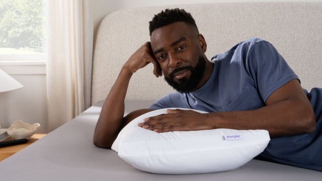 Man with cloud pillow