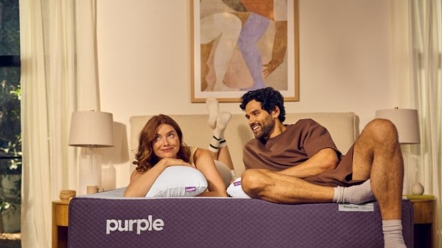 couple on purple mattress