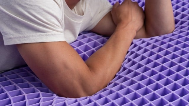 talent laying on grid