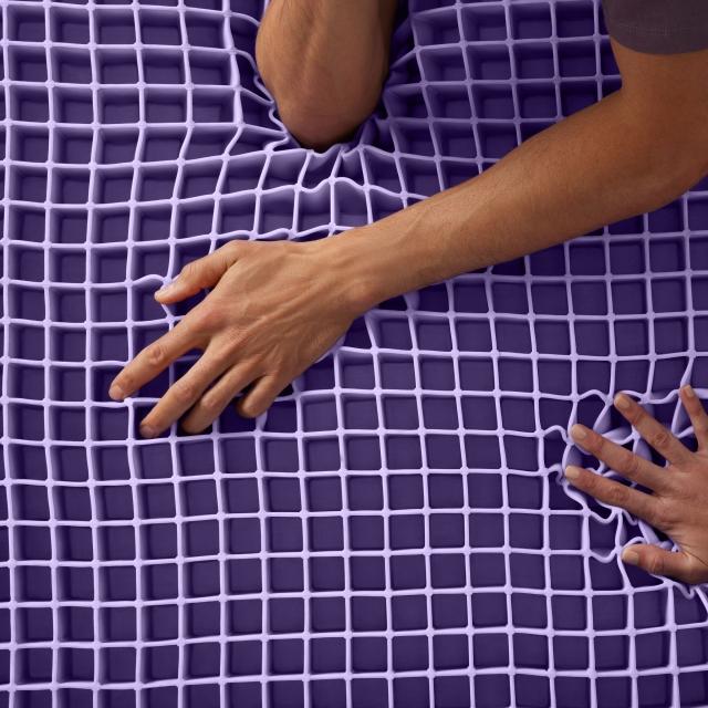 arm on purple grid