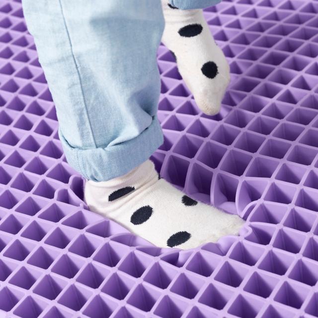 Kid stepping on exposed grid
