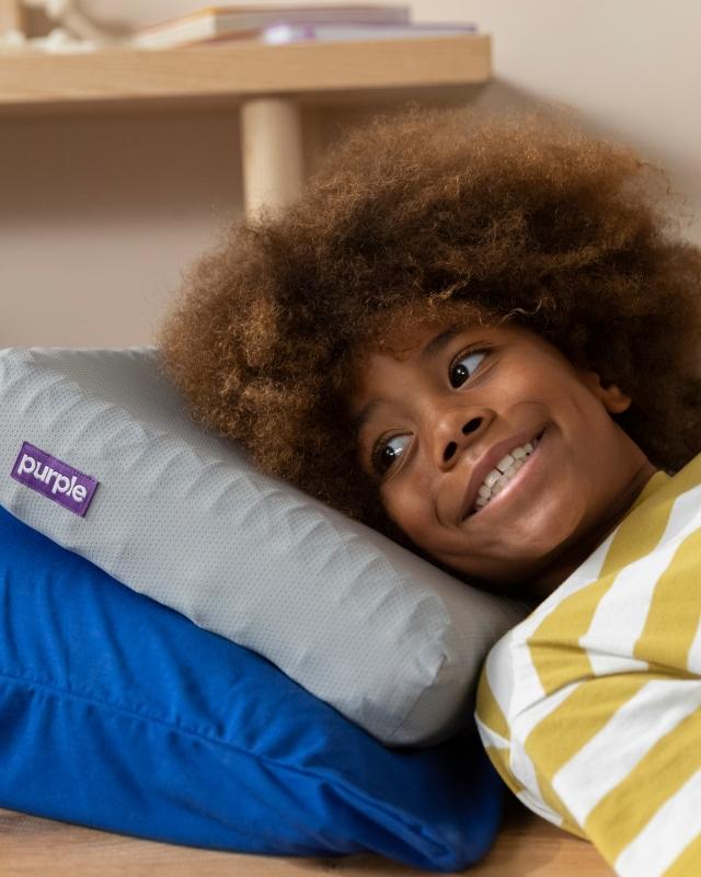 Grey kid purple pillow
