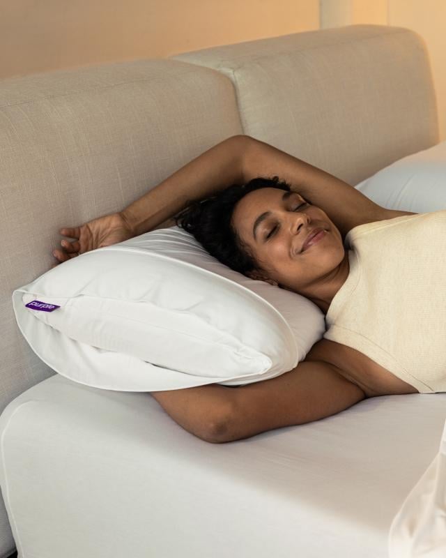 woman using Harmony Pillow