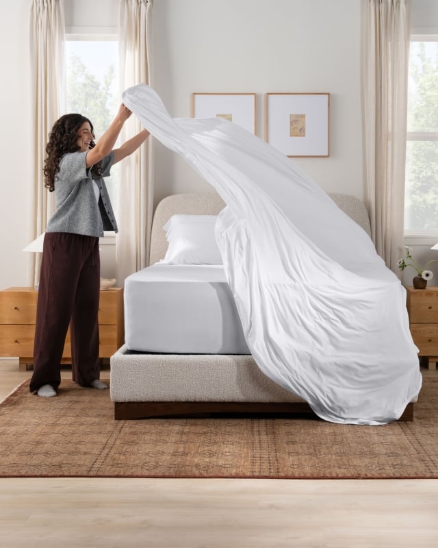 SS sheets white talent making bed