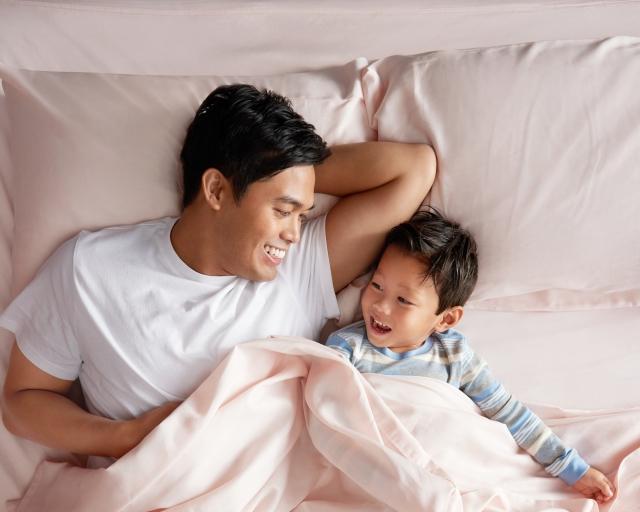 Man and son in SoftStretch sheets