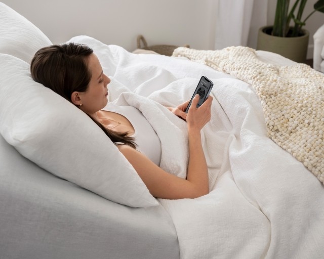 Woman using sleep genius app