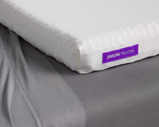 Purple pillow with SoftStretch sheets