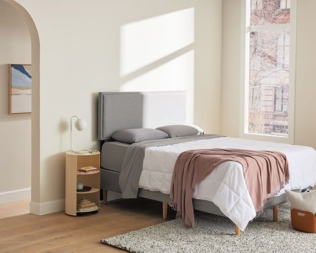 Bedroom scene with Purple Mattress, Bed Frame & Bedding