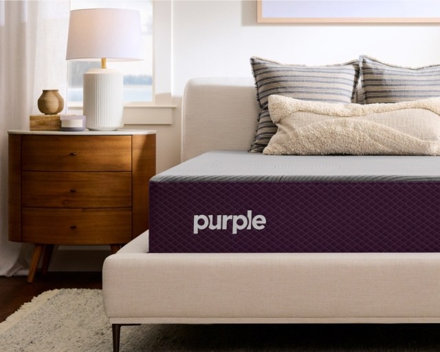 Purple RestorePlus™ Hybrid Mattress in a bedroom.