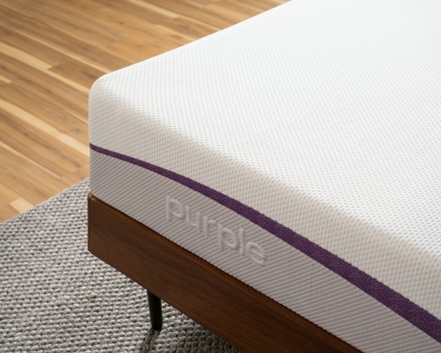 Corner of a Purple mattress.