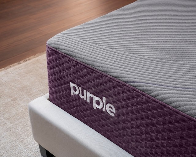 A corner of a Purple RestorePremier mattress.