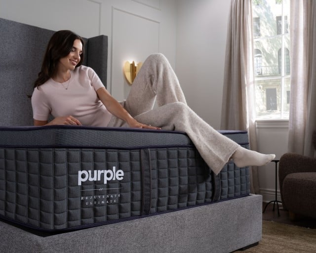 Woman lounging on RejuvenateUltimate mattress