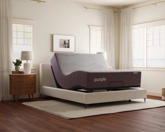 The RestorePremier hybrid mattress on an adjustable base to demonstrate its flexibility.