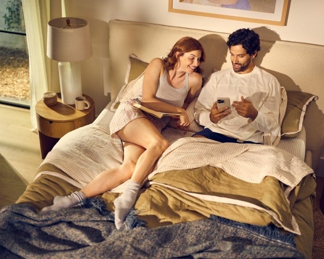 talent on dressed bed