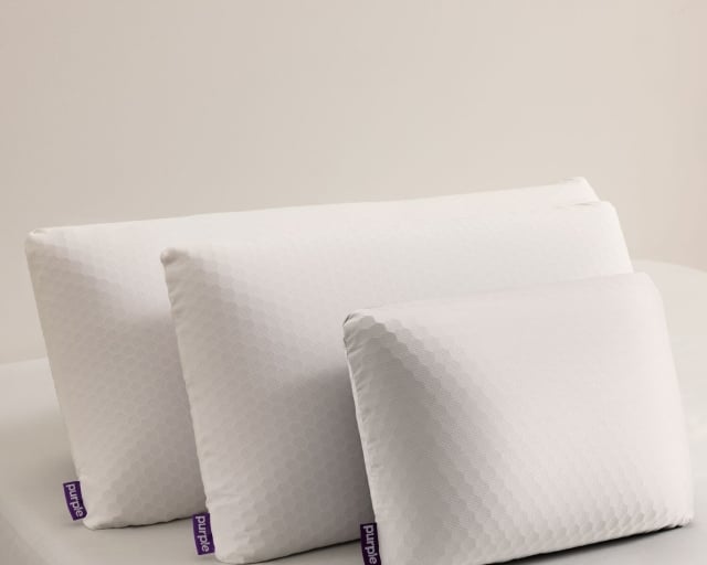 Different size purple pillows