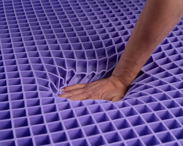 Hand pressing into GelFlex Grid