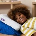 White kid purple pillow