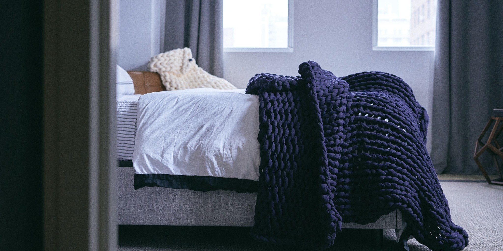 How Heavy Should a Weighted Blanket Be? [Weight Guide]