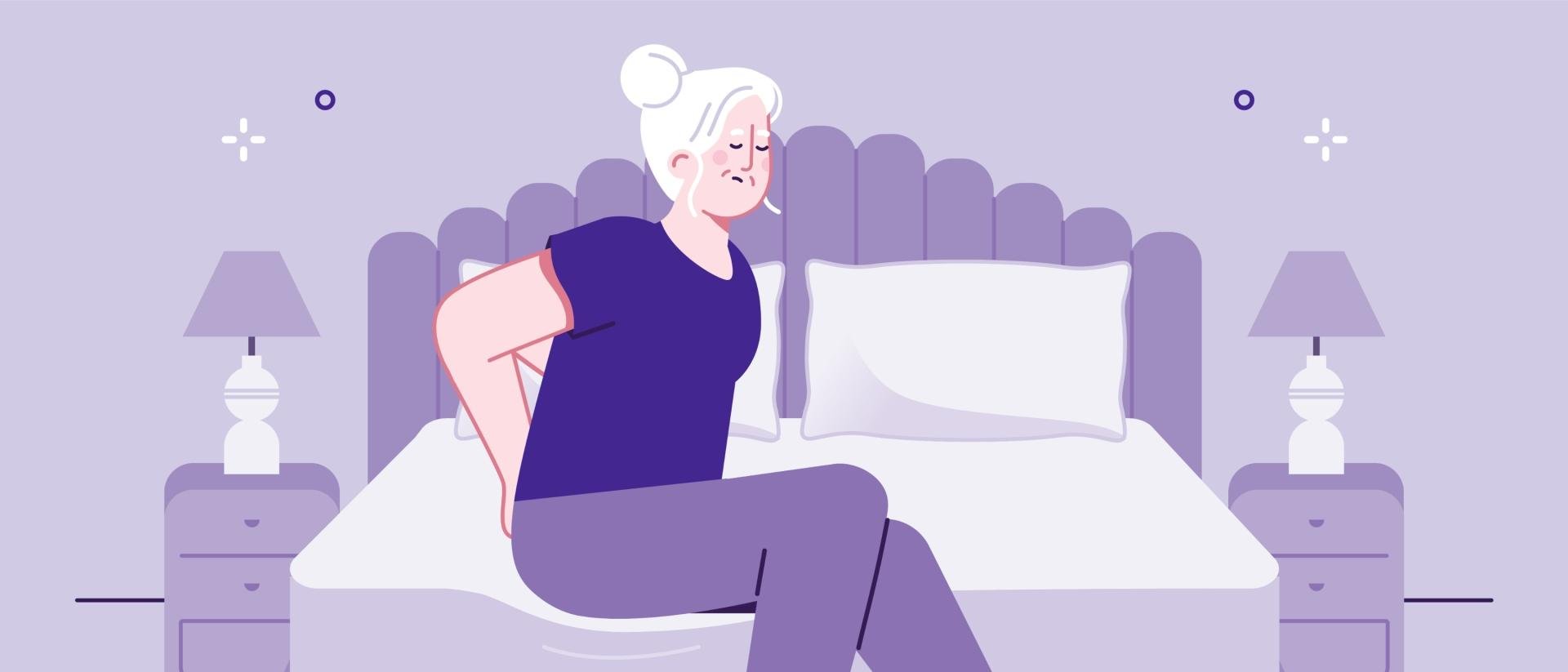 older woman sitting on soft mattress