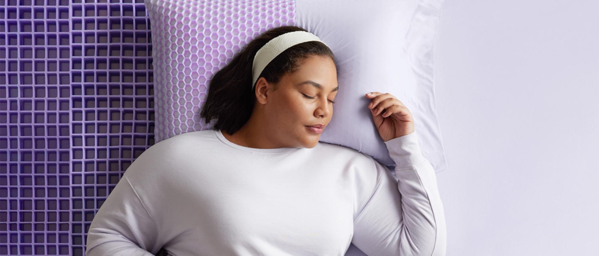 Woman on Half Exposed Grid Mattress and pillow