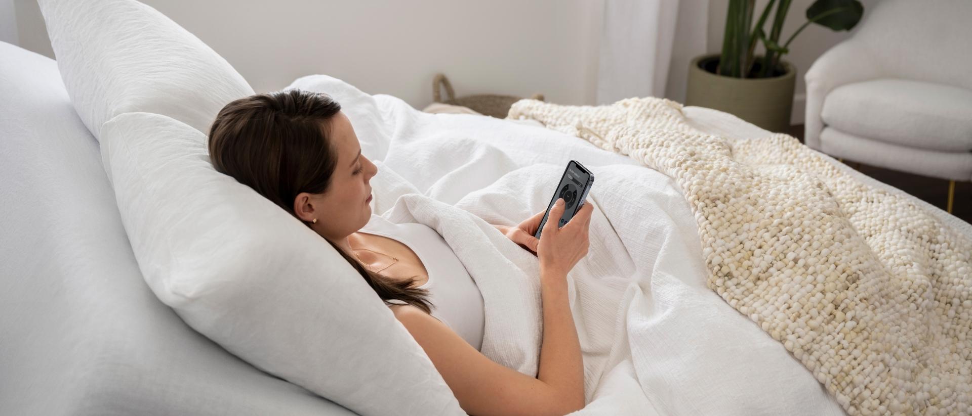 Woman using sleep genius app