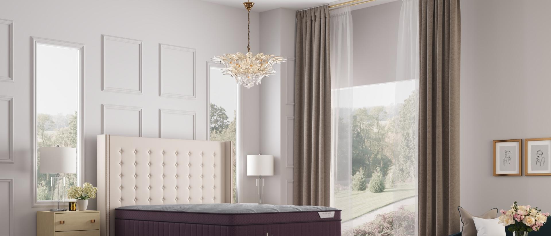 A Purple RejuvenatePlus mattress in an open, airy bedroom.