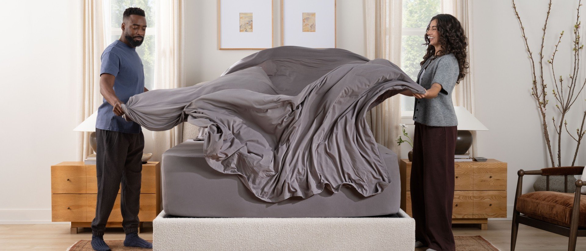 SS sheets gray w/ talent making bed