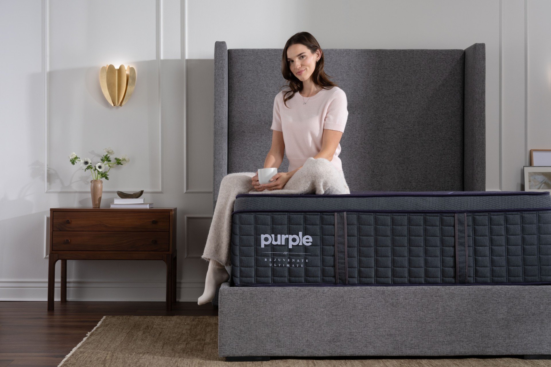 RejuvenateUltimate mattress with model on bed