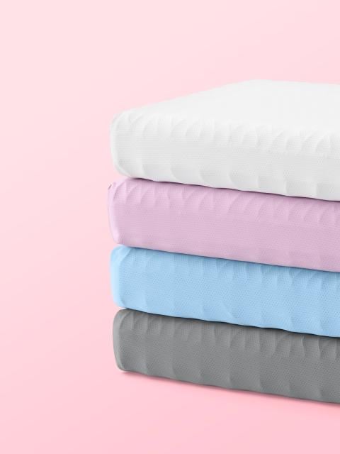 Stack of Kid's Purple Pillows