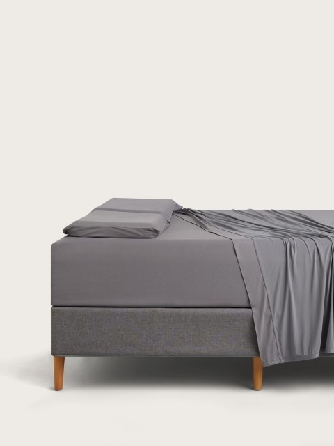 Kids Purple Sheets dressed bed gray